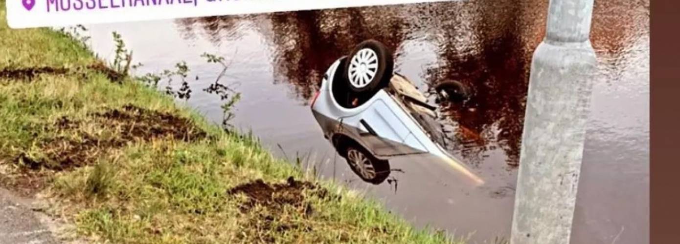 Auto te water in Musselkanaal; bestuurder gewond